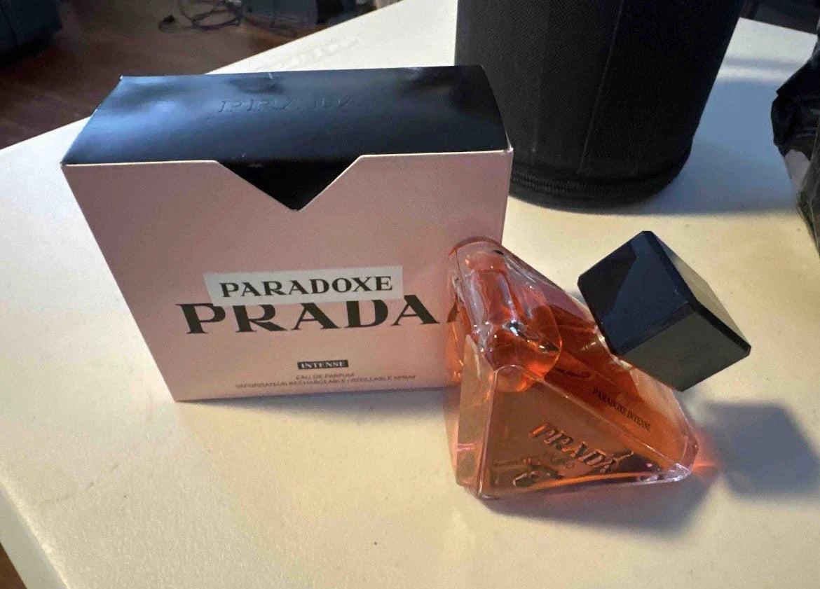 Prada Paradoxe perfume bottle and packaging on a table